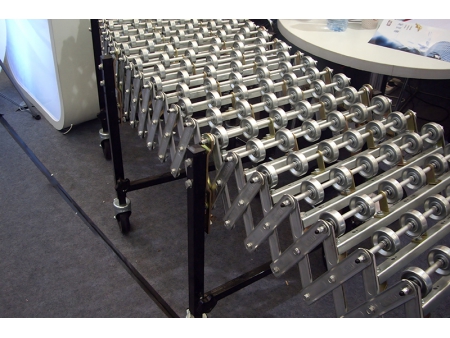 Роликовый телескопический конвейер